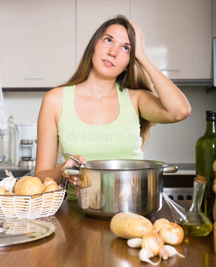 tired woman kitchen stock from dreamstime